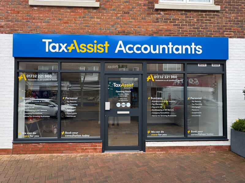 An image of the exterior storefront signage for Taxassist Accountants.